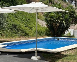 Piscina de Casa adosada de lloguer en Almuñécar amb Jardí privat, Terrassa i Traster