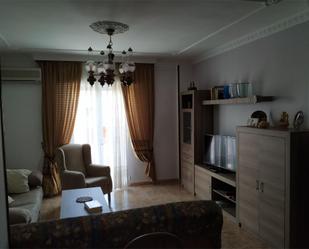 Sala d'estar de Casa adosada de lloguer en El Cuervo de Sevilla amb Aire condicionat, Terrassa i Balcó