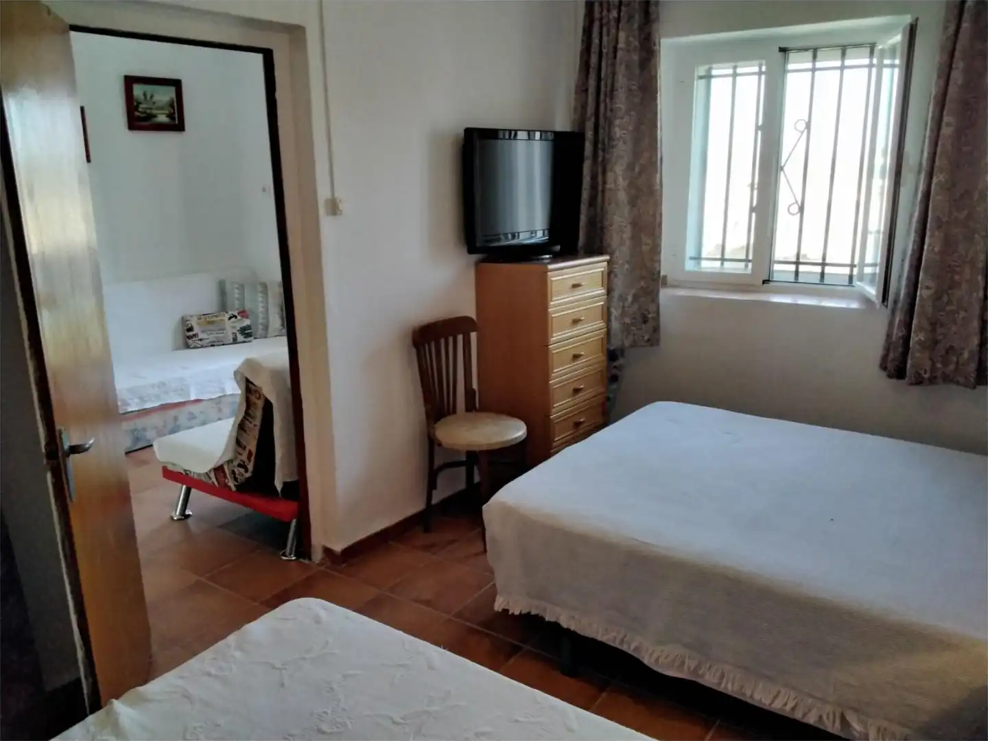 Habitación de Casa adosada en venta en Villanueva del Río y Minas con Aire acondicionado, Calefacción y Amueblado