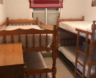 Dormitori de Pis de lloguer en Chipiona amb Aire condicionat
