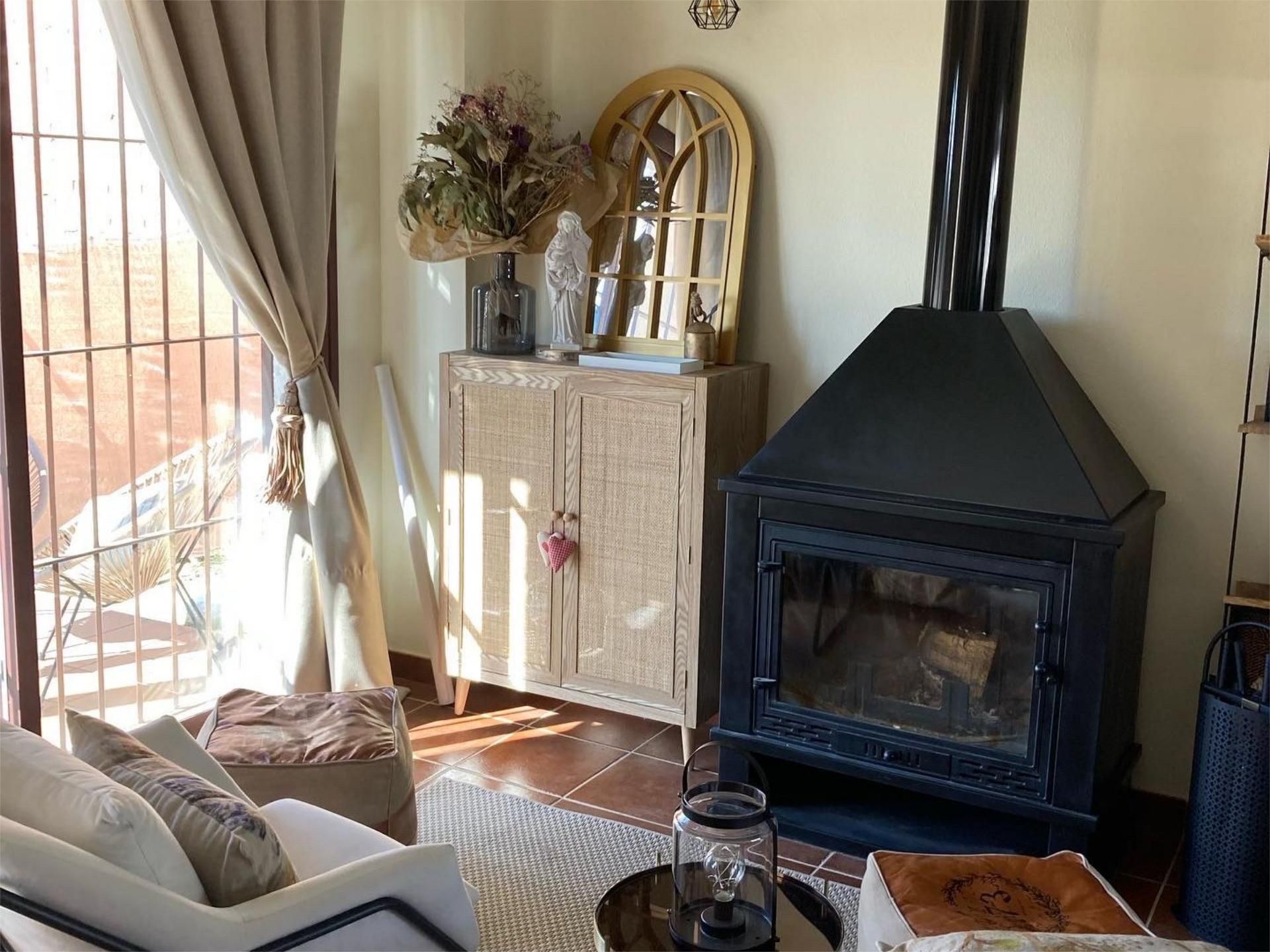 Sala d'estar de Casa adosada en venda en El Ronquillo amb Aire condicionat, Calefacció i Jardí privat