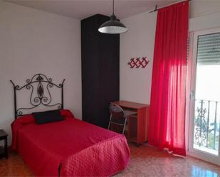 Dormitori de Apartament de lloguer en Ugíjar