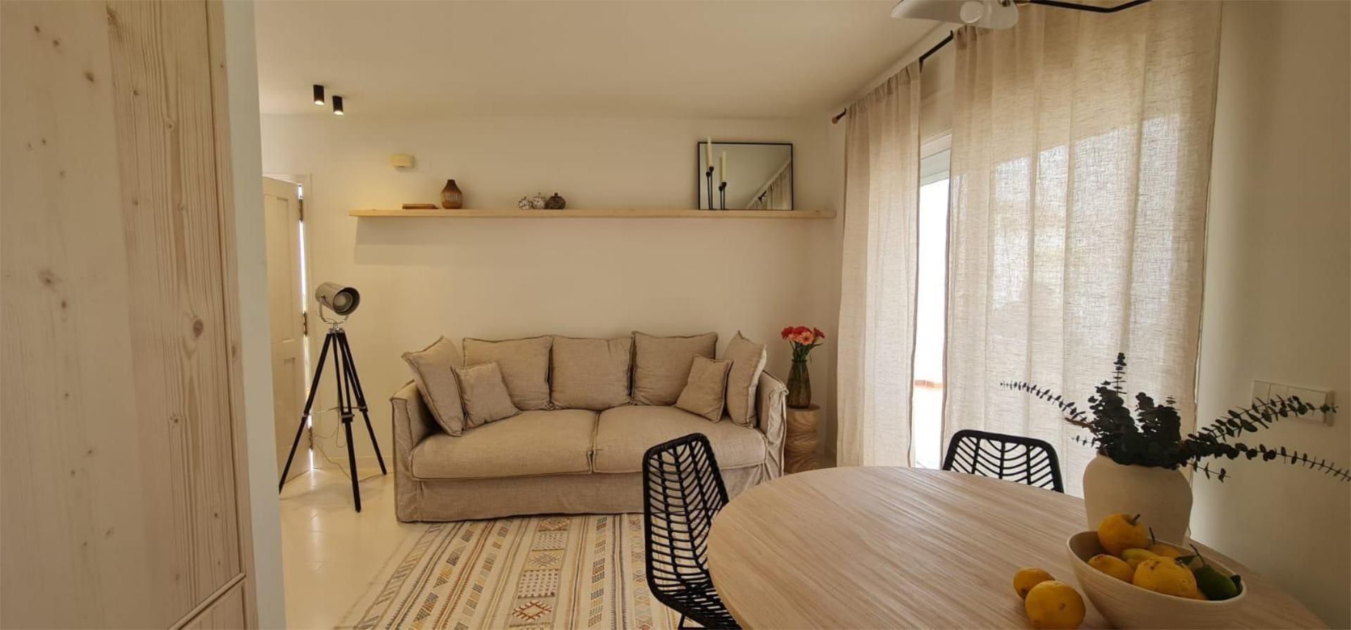 Sala d'estar de Casa adosada en venda en Calpe / Calp amb Aire condicionat i Terrassa