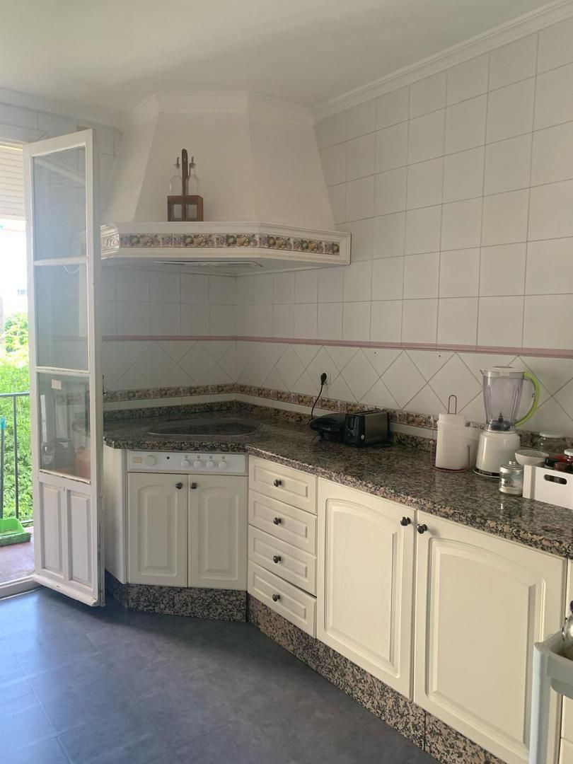 Kitchen of Flat to share in Los Corrales  with Terrace, Oven and Washing machine