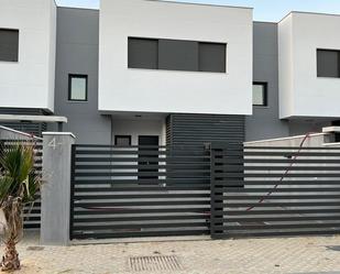 Exterior view of Single-family semi-detached to rent in Aljaraque  with Air Conditioner, Terrace and Swimming Pool