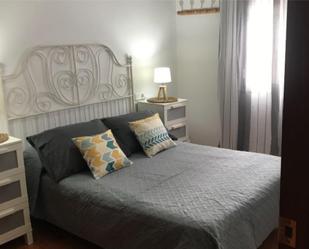 Dormitori de Apartament de lloguer en Ayamonte amb Aire condicionat i Balcó