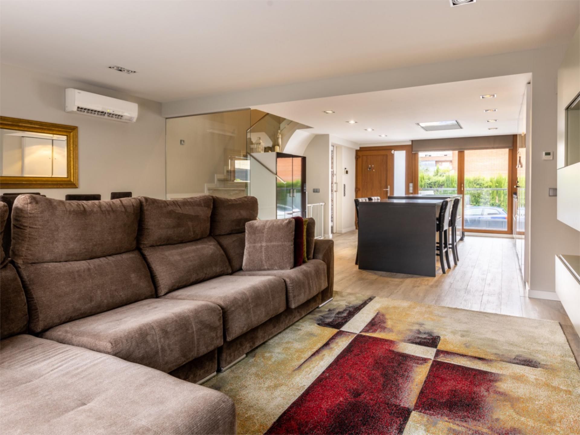 Sala de estar de Casa adosada en venta en El Vendrell con Aire acondicionado, Calefacción y Jardín privado
