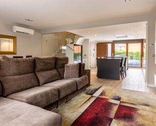 Living room of Single-family semi-detached for sale in El Vendrell  with Air Conditioner, Terrace and Balcony