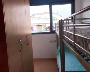 Dormitori de Pis de lloguer en Garrucha amb Aire condicionat, Terrassa i Piscina