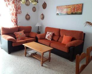 Sala d'estar de Apartament de lloguer en El Puerto de Santa María amb Terrassa i Piscina