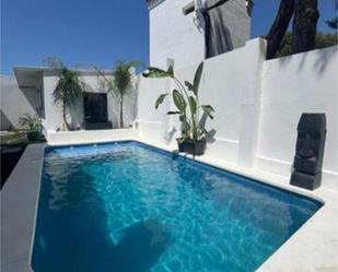 Swimming pool of Single-family semi-detached for sale in Isla Cristina  with Terrace and Swimming Pool