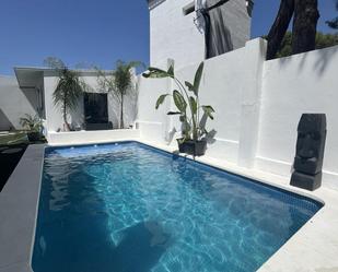 Swimming pool of House or chalet for sale in Isla Cristina  with Air Conditioner, Heating and Private garden