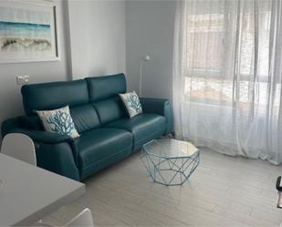 Sala d'estar de Pis de lloguer en Zahara de los Atunes amb Aire condicionat i Piscina