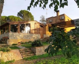 Jardí de Finca rústica en venda en Cassà de la Selva amb Aire condicionat, Terrassa i Piscina