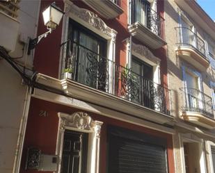 Vista exterior de Casa adosada en venda en Cullera amb Aire condicionat, Terrassa i Balcó