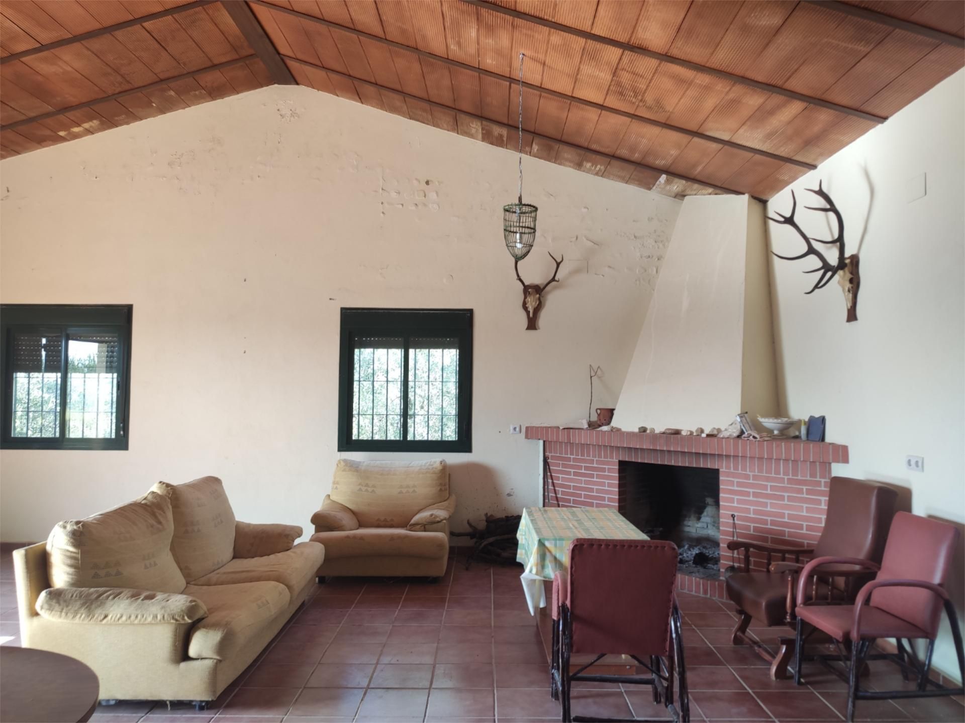 Sala d'estar de Finca rústica en venda en Guillena