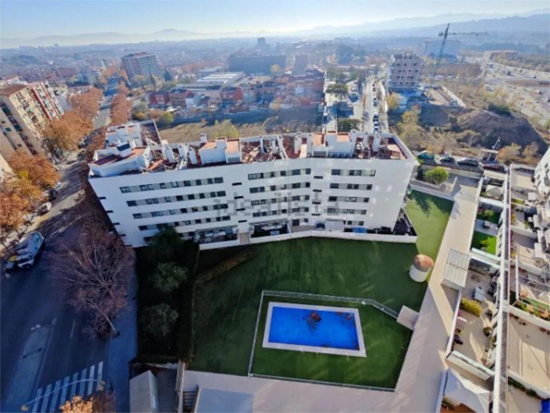 Exterior view of Flat for sale in Sabadell  with Air Conditioner, Swimming Pool and Balcony