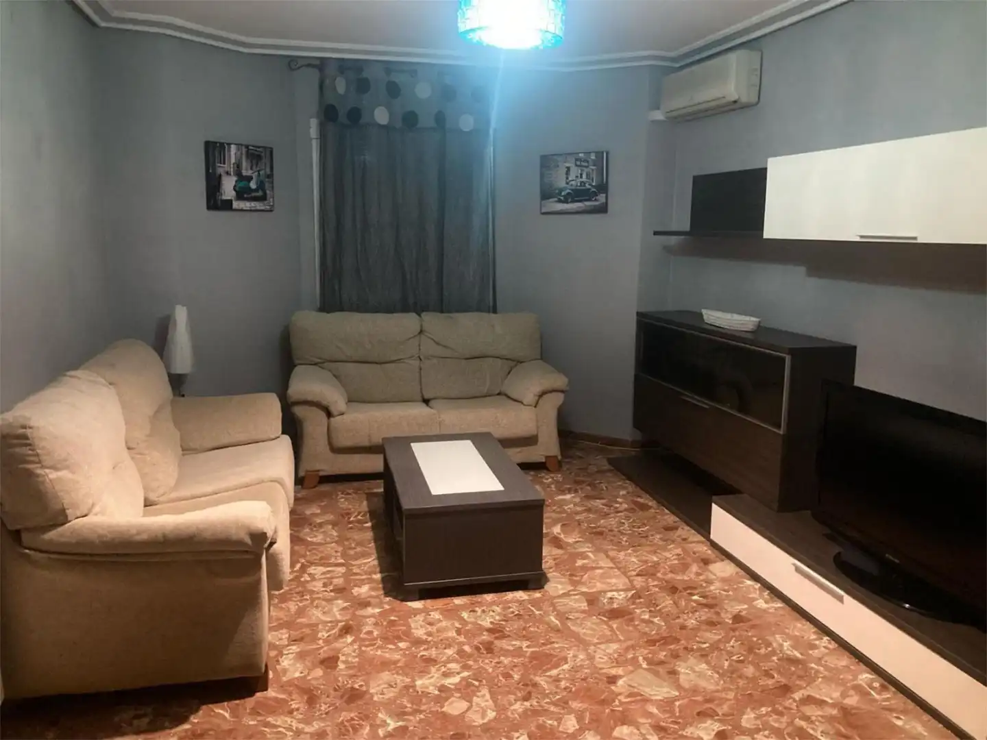 Sala de estar de Casa adosada en venta en Benamaurel con Aire acondicionado, Calefacción y Parquet