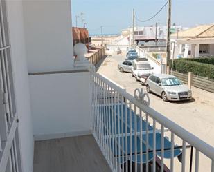 Exterior view of Single-family semi-detached for sale in Punta Umbría  with Balcony