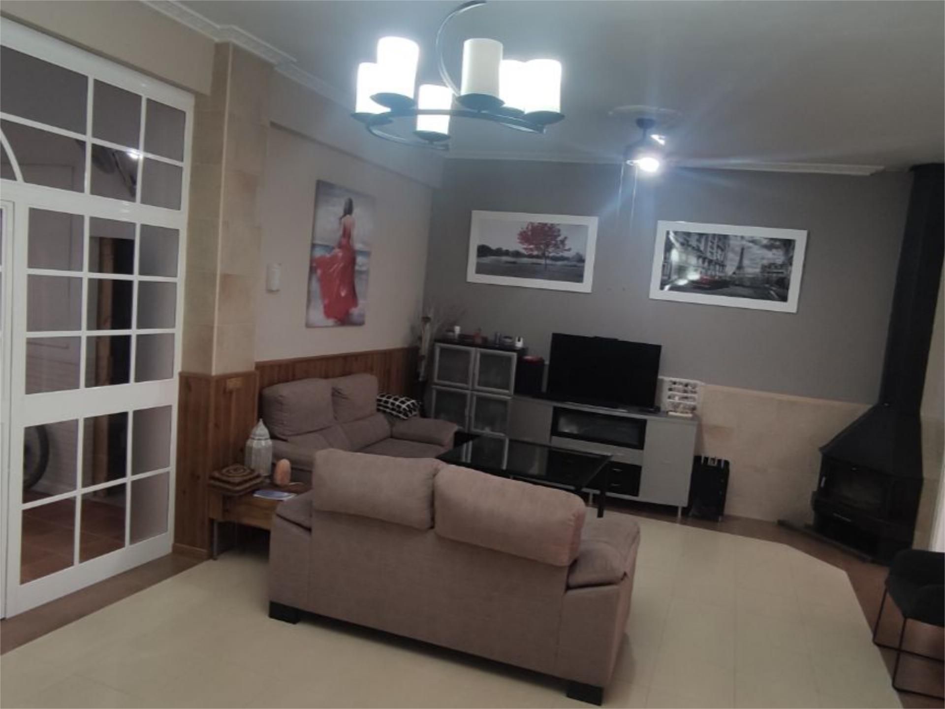 Living room of Single-family semi-detached for sale in Guillena  with Air Conditioner, Heating and Parquet flooring