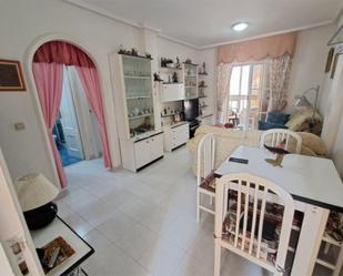 Dining room of Flat for sale in Torrevieja  with Air Conditioner, Terrace and Swimming Pool