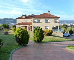 Exterior view of House or chalet for sale in Pontevedra Capital   with Terrace, Swimming Pool and Balcony