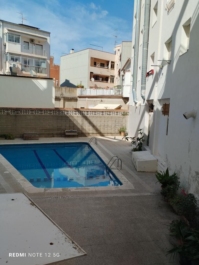 Swimming pool of Flat for sale in Malgrat de Mar  with Air Conditioner and Swimming Pool