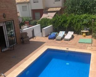 Swimming pool of House or chalet for sale in  Granada Capital  with Air Conditioner and Swimming Pool