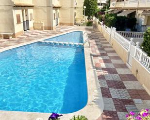 Swimming pool of Flat for sale in Santa Pola  with Air Conditioner, Terrace and Swimming Pool