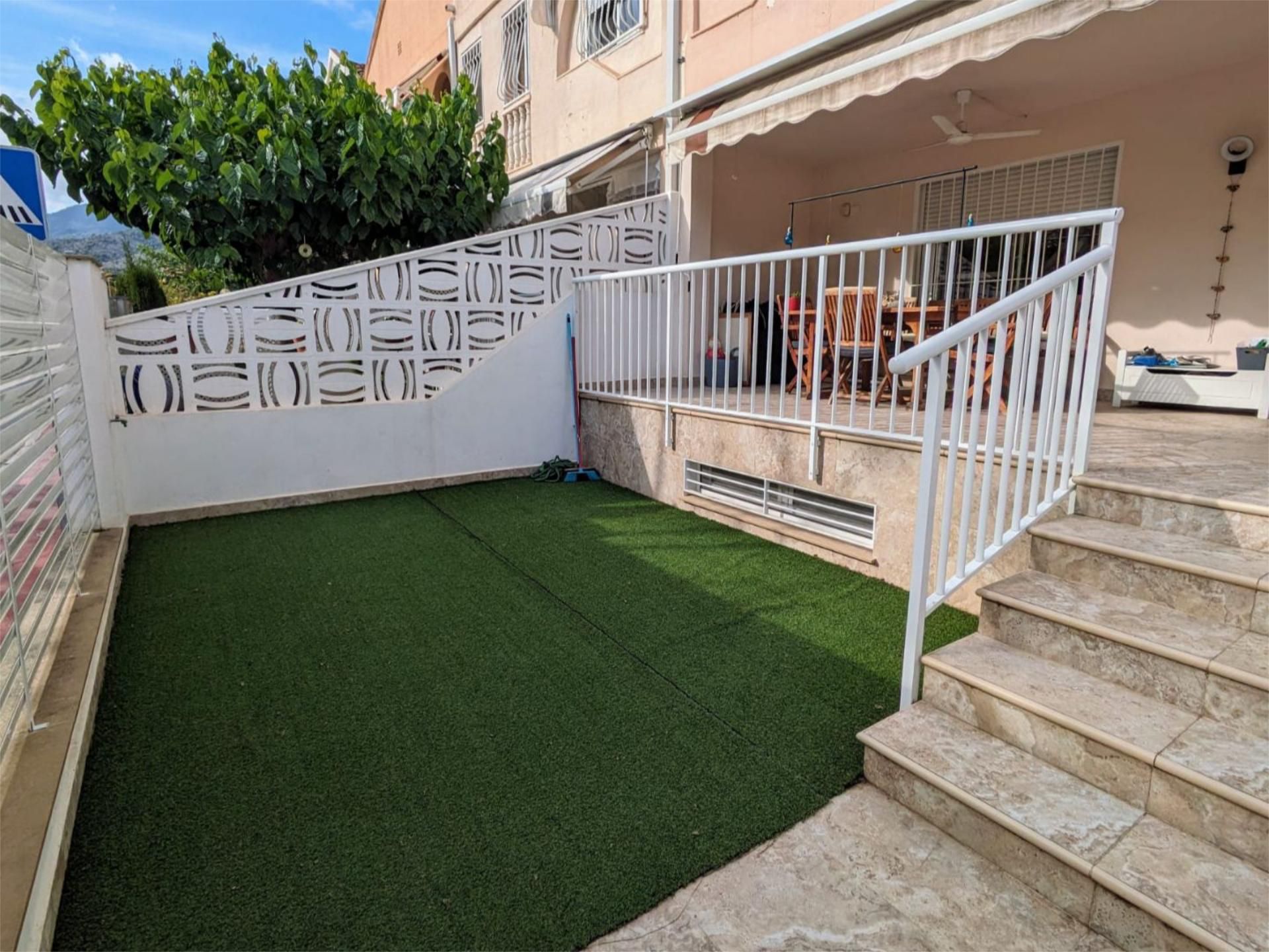 Jardí de Casa adosada en venda en Benicasim / Benicàssim amb Aire condicionat, Terrassa i Piscina