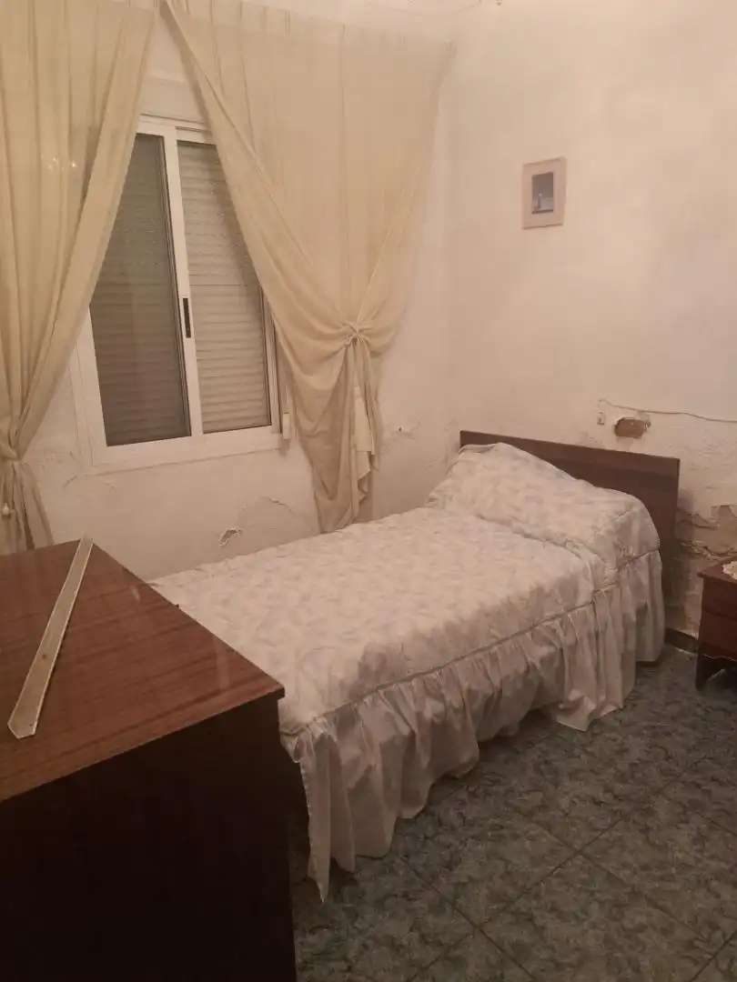 Casa adosada en venda a Calle Lepanto, 40, Lorquí Dormitori de Casa adosada en venda en Lorquí amb Aire condicionat, Terrassa i Moblat