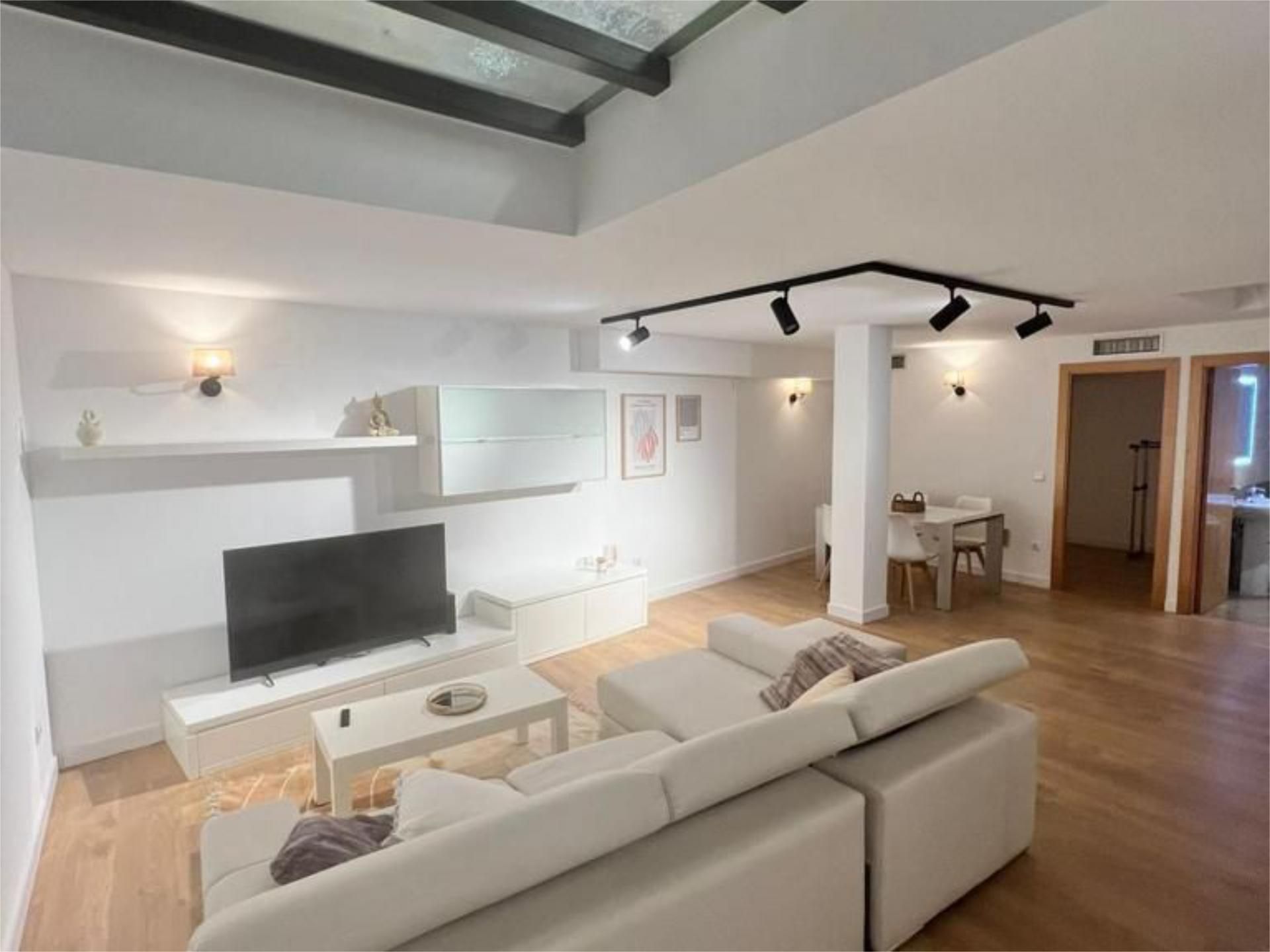 Sala d'estar de Dúplex de lloguer en Alella amb Aire condicionat