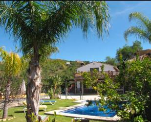 Garden of House or chalet to rent in Guaro  with Air Conditioner, Terrace and Swimming Pool