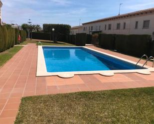 Swimming pool of Single-family semi-detached for sale in El Vendrell  with Air Conditioner, Terrace and Swimming Pool