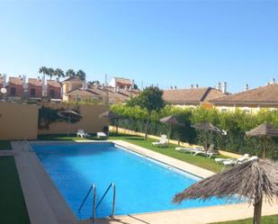 Swimming pool of Apartment for sale in Islantilla