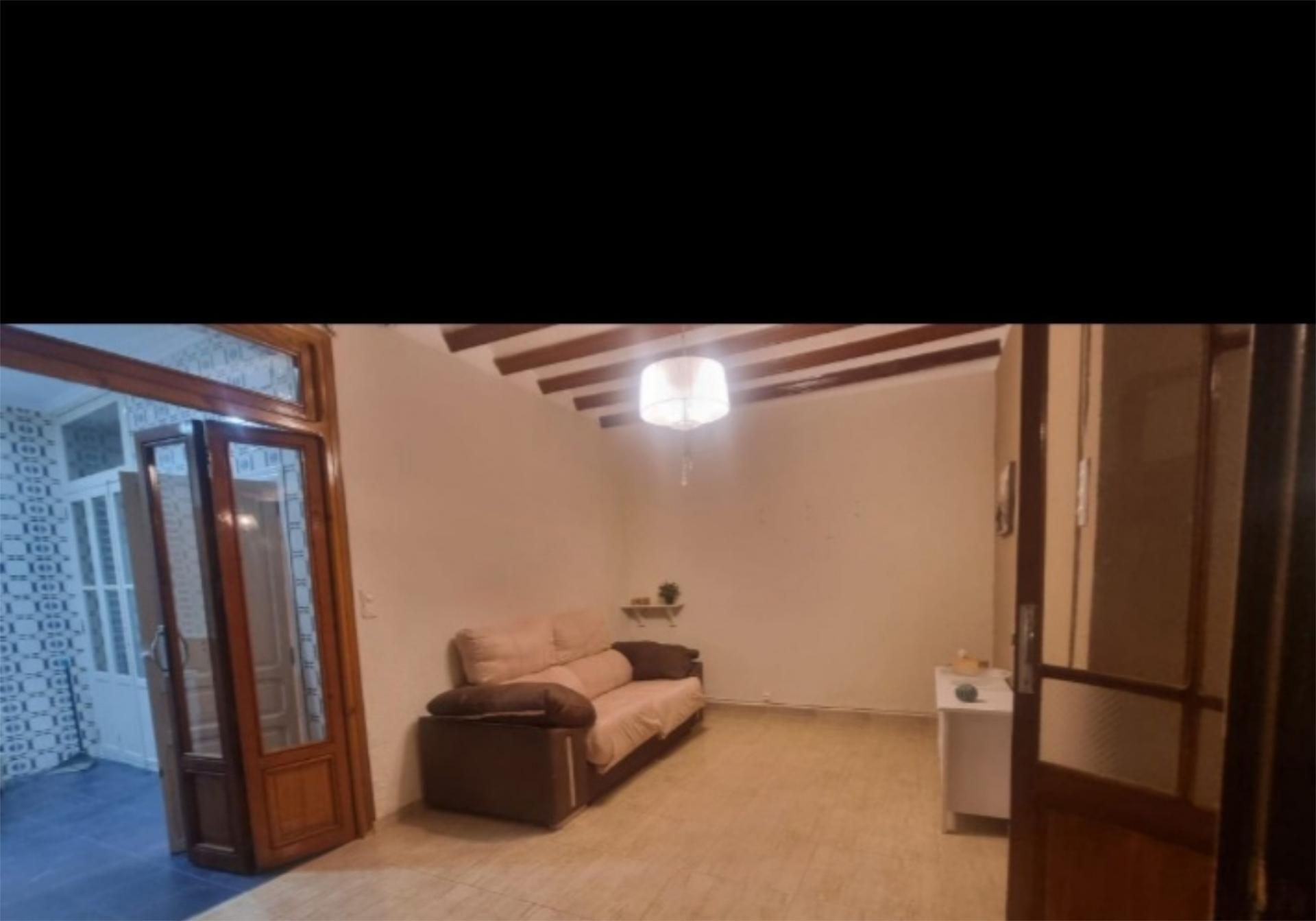 Sala d'estar de Casa adosada en venda en La Vall d'Uixó amb Aire condicionat, Terrassa i Balcó