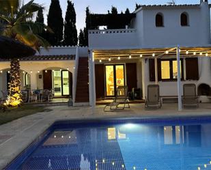 Exterior view of House or chalet for sale in Castelló d'Empúries  with Air Conditioner, Terrace and Swimming Pool