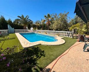 Piscina de Casa adosada en venda en L'Alfàs del Pi amb Piscina