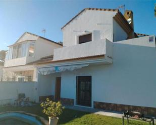 Exterior view of Single-family semi-detached for sale in Mazagón  with Terrace and Swimming Pool