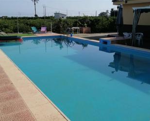 Swimming pool of House or chalet for sale in Alzira  with Air Conditioner, Terrace and Swimming Pool