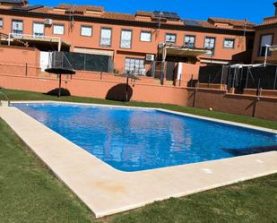 Swimming pool of Single-family semi-detached for sale in Guillena  with Air Conditioner, Terrace and Swimming Pool