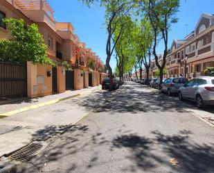 Exterior view of Single-family semi-detached for sale in Tomares  with Air Conditioner, Terrace and Swimming Pool