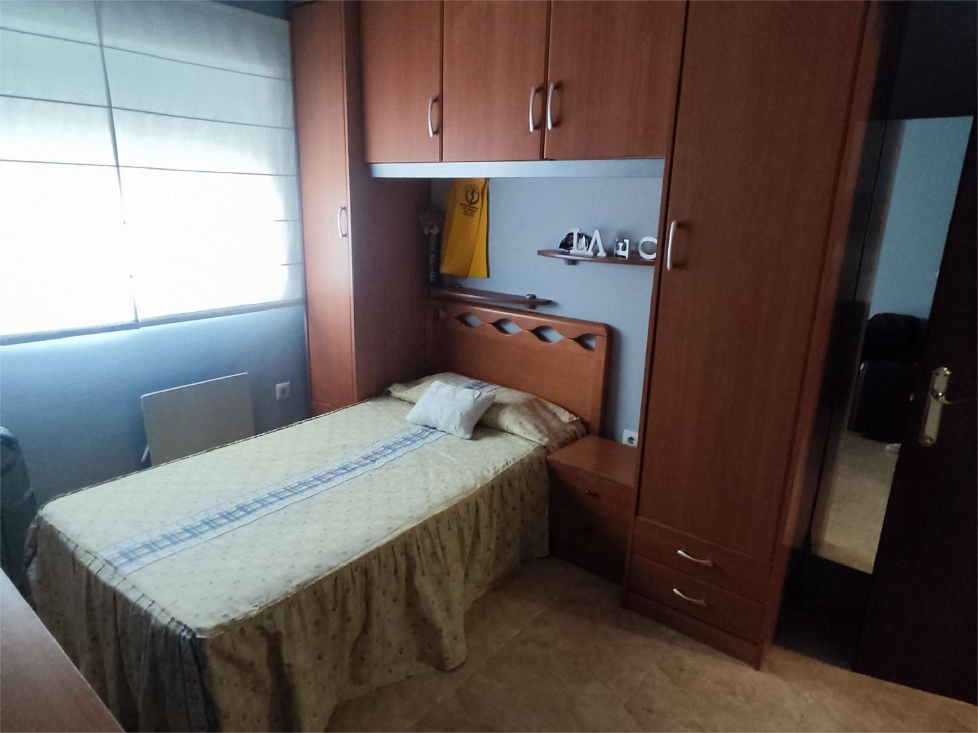 Bedroom of Single-family semi-detached for sale in Sierra de Fuentes  with Air Conditioner and Swimming Pool