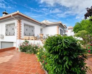 Exterior view of House or chalet for sale in Cúllar Vega  with Air Conditioner and Terrace