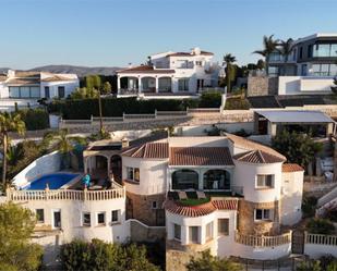 Vista exterior de Casa o xalet en venda en Moraira amb Aire condicionat, Terrassa i Piscina