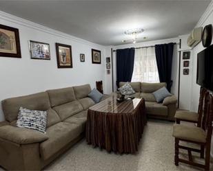 Living room of Flat for sale in Bollullos Par del Condado  with Air Conditioner, Furnished and Community parking