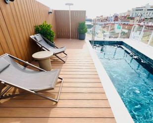 Swimming pool of Flat for sale in  Madrid Capital  with Air Conditioner, Heating and Private garden