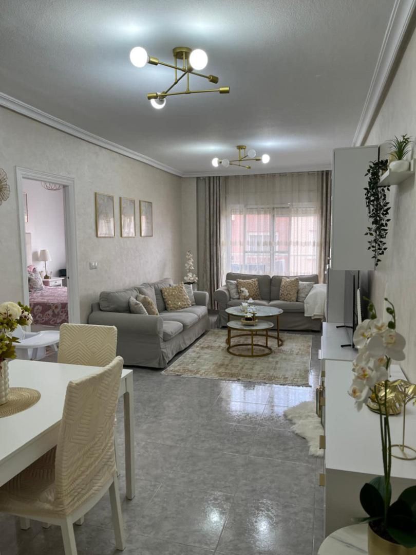 Living room of Flat for sale in Los Montesinos  with Air Conditioner, Terrace and Furnished
