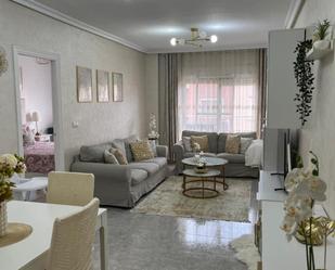 Living room of Flat for sale in Los Montesinos  with Air Conditioner, Terrace and Furnished