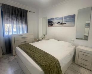 Bedroom of Flat to share in Estepona  with Washing machine, TV and Internet